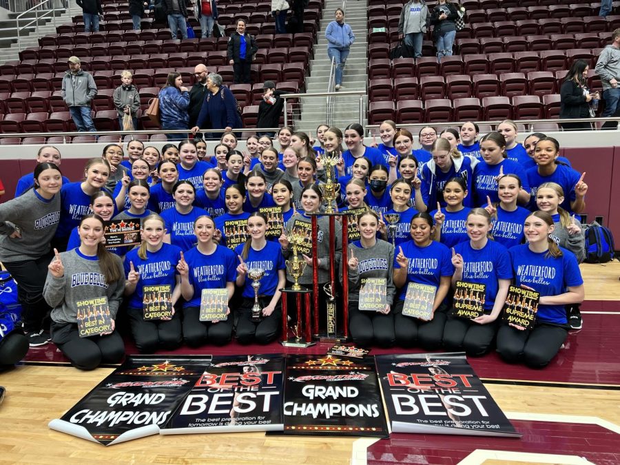 Blue Belles Pose With Trophies To Show Off Their Win